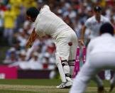 Australia's David Warner is bowled out by England's Stuart Broad during the first day of the fifth Ashes cricket test match in Sydney January 3, 2014. REUTERS/David Gray