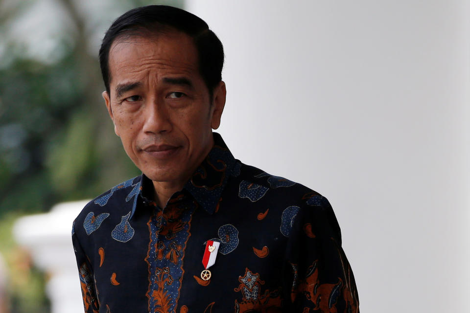 Indonesian President Joko Widodo reacts as he waits for Dutch Prime Minister Mark Rutte before a welcoming ceremony at the presidential palace in Bogor, Indonesia, October 7, 2019. REUTERS/Willy Kurniawan