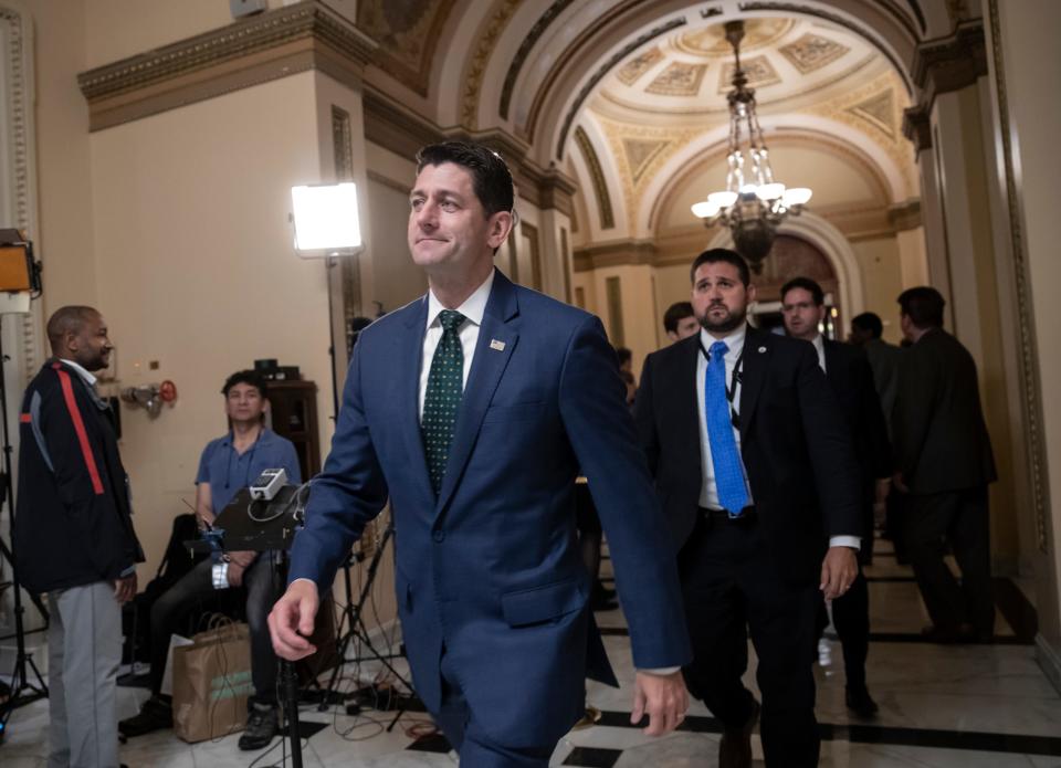 Then-House Speaker Paul Ryan, R-Wis., emerges from the House chamber in 2018. He told journalist Mark Leibovich that he was "sobbing" as he watched the Capitol riot on Jan. 6.
