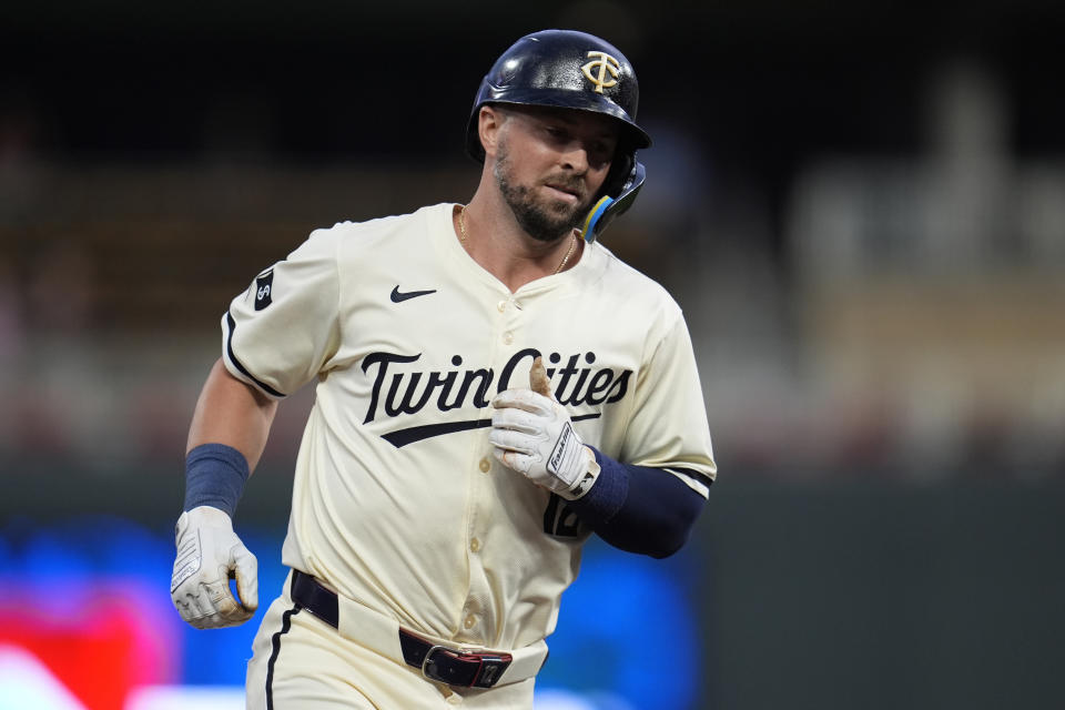 Minnesota Twins' Kyle Farmer runs the bases after hitting a 3-run home run during the second inning of a baseball game against the Los Angeles Angels, Tuesday, Sept. 10, 2024, in Minneapolis. (AP Photo/Abbie Parr)