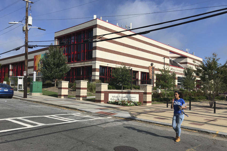 The campus of Clark Atlanta University is seen Wednesday, April 21, 2019, in Atlanta. Four college students were wounded when a gunman opened fire into a crowd of 200 people outside a library near the university, Tuesday night, and then escaped in the chaos, authorities said. (AP Photo/Jeff Martin)