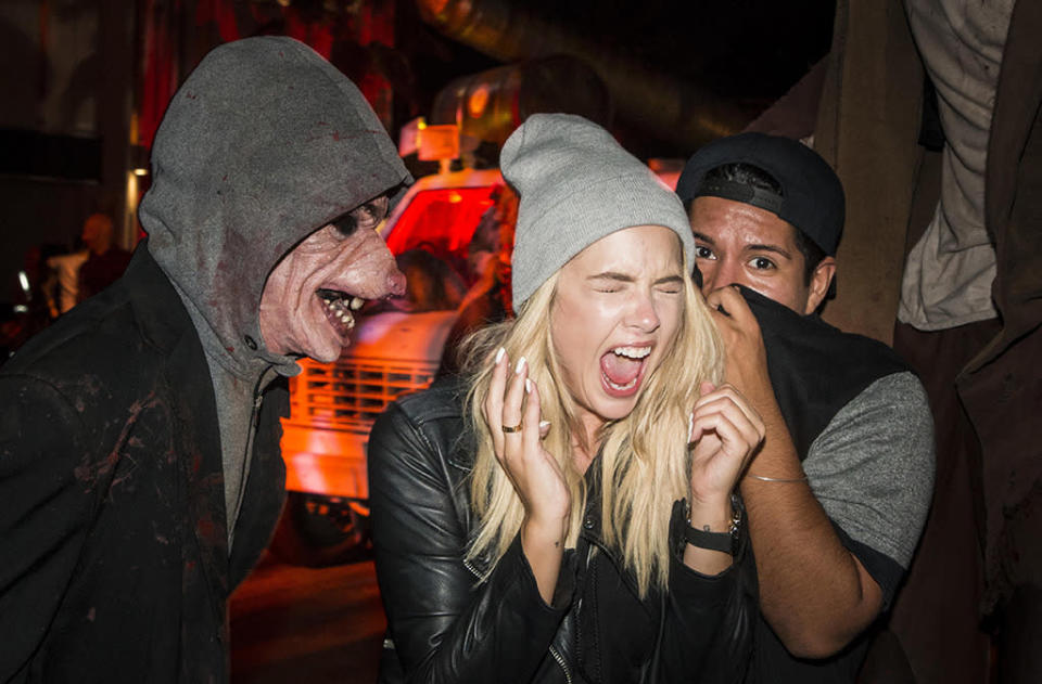 'Pretty Little Liars’ Ashley Benson’s scared face in this snapshot taken during Halloween Horror Nights at Universal Studios looked so believable that it could double as a poster for a horror flick. (Courtesy of NBC Universal)