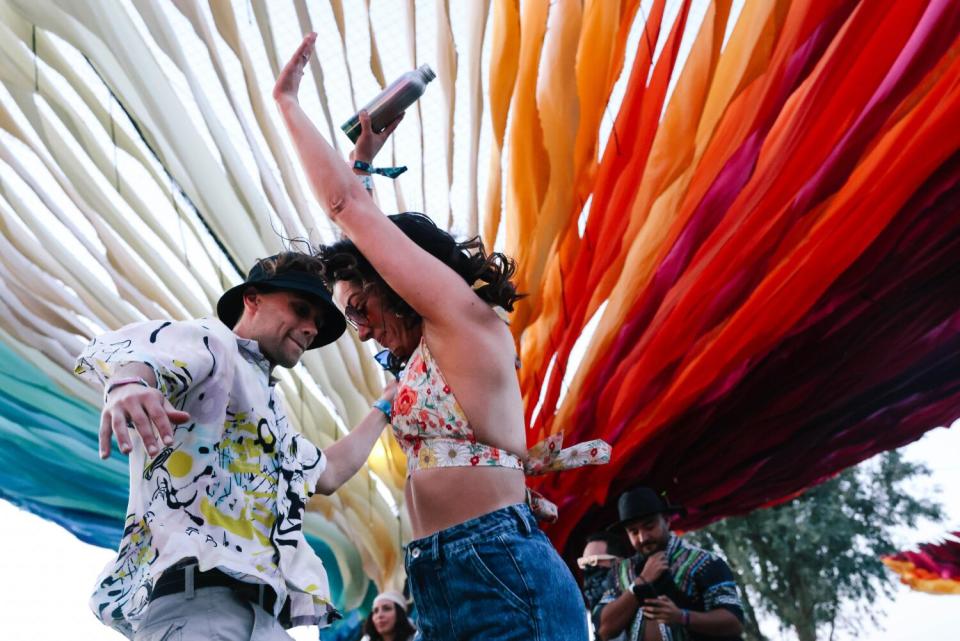 Brandon and Kari Bulat dance together at Do LaB at the Coachella Valley Music and Arts Festival.
