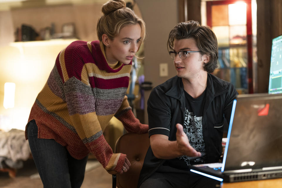 This image released by 20th Century Studios shows Jodie Comer, left, and Joe Keery in a scene from "Free Guy." (Alan Markfield/20th Century Studios via AP)