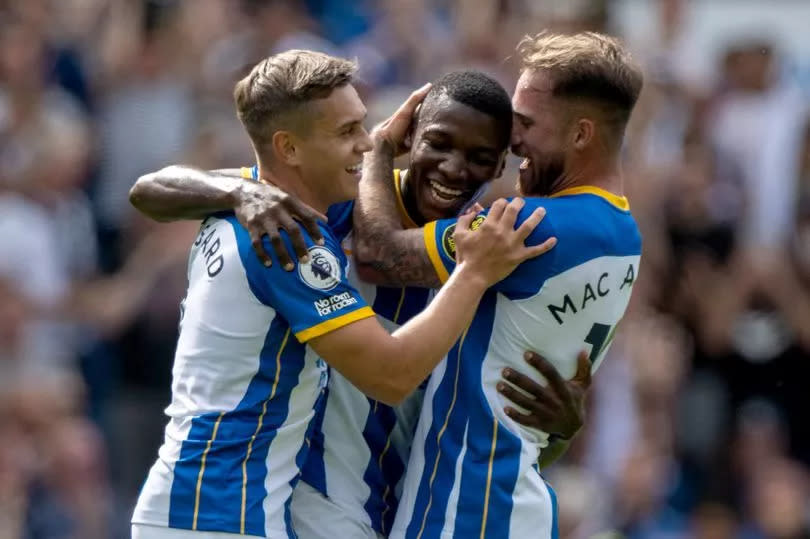 Moises Caicedo of Brighton & Hove Albion celebrates with Leandro Trossard and Alexis Mac Allister after scoring goal during the Premier League match between Brighton & Hove Albion and Leicester City at American Express Community Stadium on September 4, 2022 in Brighton, United Kingdom.