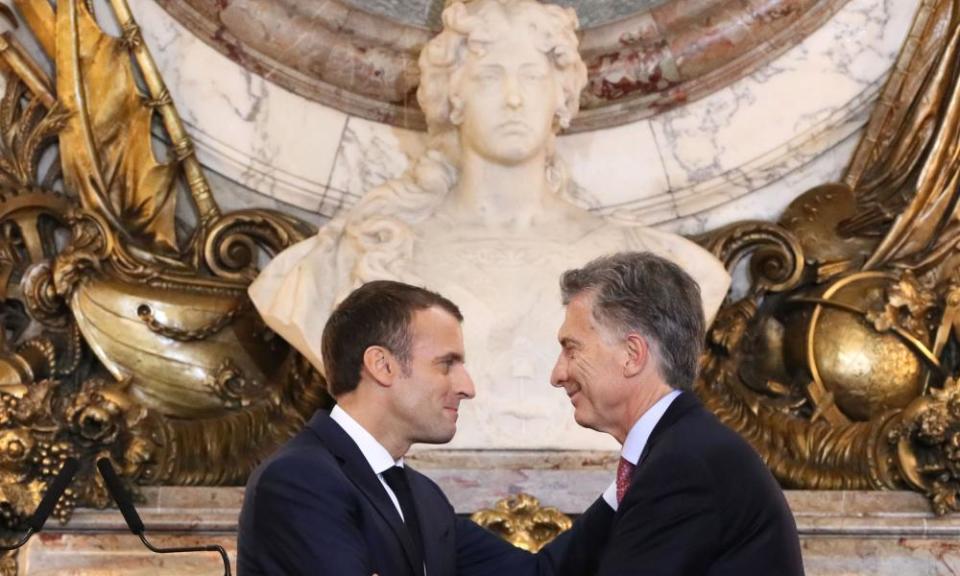 Emmanuel Macron and Mauricio Macri greet each other in Buenos Aires on 29 November.