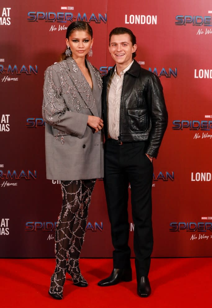 Zendaya poses on the red carpet with boyfriend Tom Holland at the London premiere of ‘Spider-Man: No Way Home.’ - Credit: Splash