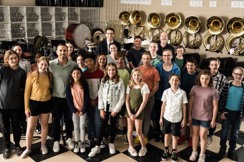 Green Bay Packers head coach Matt LaFleur poses with some of his co-stars from the Howard-Suamico School District for a new Bellin Health commercial that debuted during the Super Bowl LVIII.