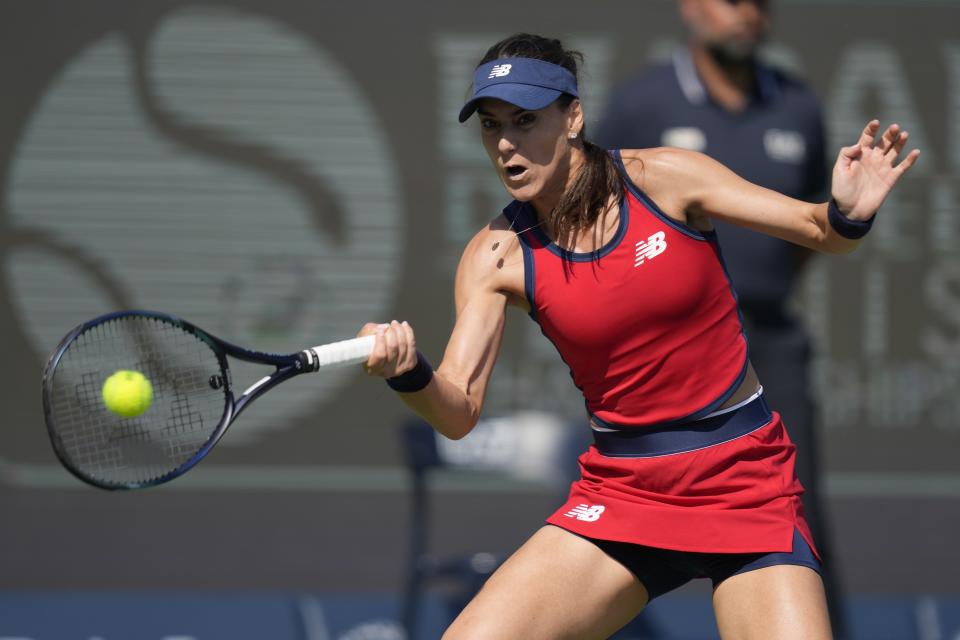 Solana Cirstea of Romania returns the ball to Marketa Vondrousova of Czech Republic during a quarter final match of the Dubai Duty Free Tennis Championships in Dubai, United Arab Emirates, Thursday, Feb. 22, 2024. (AP Photo/Kamran Jebreili)