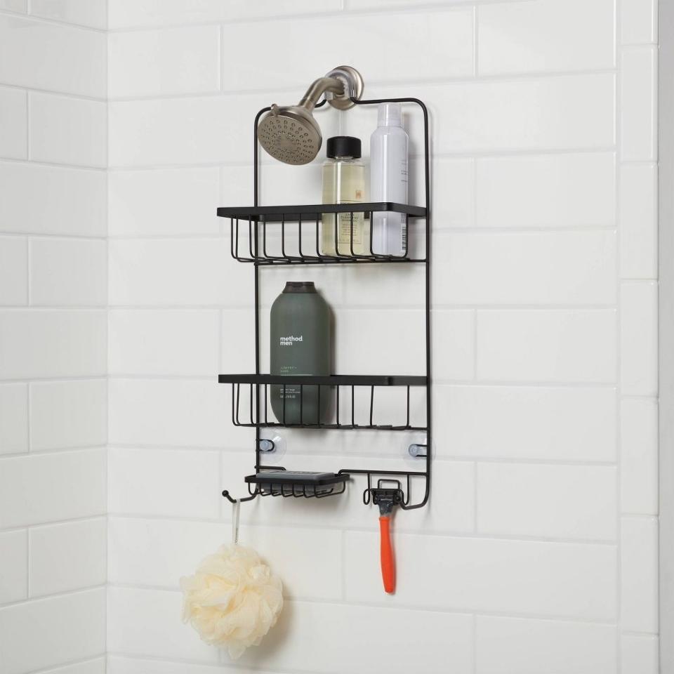 the shower caddy hanging up in a shower