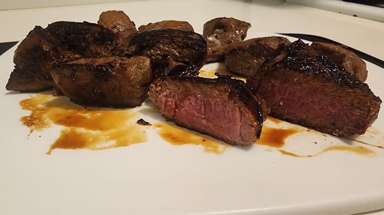 Steak tips on cutting board