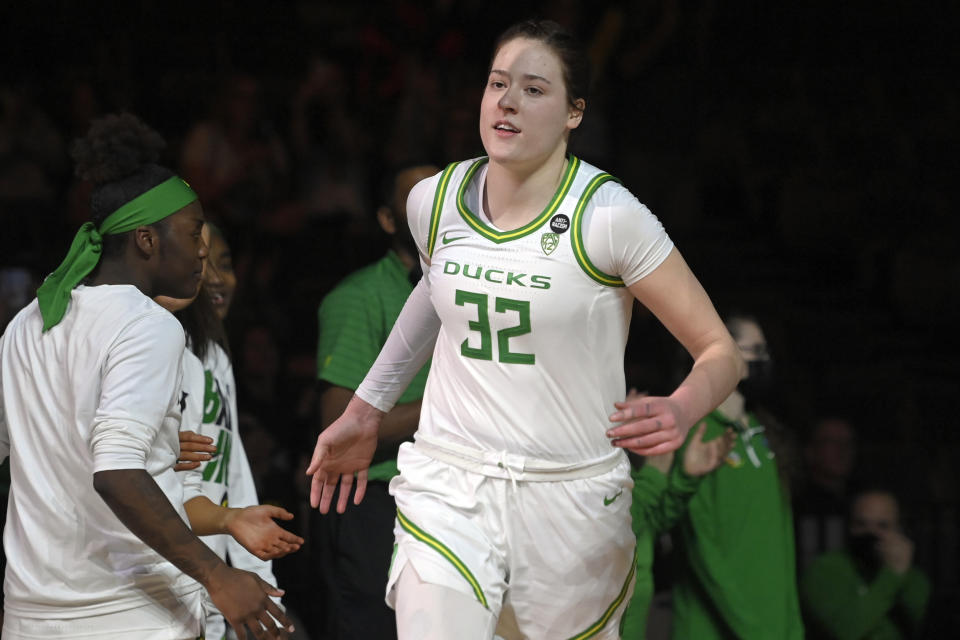 FILE - Oregon forward Sedona Prince is introduced before an NCAA college basketball game against UCLA in the quarterfinals of the Pac-12 women's tournament Thursday, March 3, 2022, in Las Vegas. Perhaps the single most impactful social media post to emerge in the NIL era came from the TikTok account of Oregon's Sedona Prince. Her takedown of the NCAA for the sparse weight room facilities at the 2021 women's tournament shined a spotlight on the disparities between men's vs. women's college sports. (AP Photo/David Becker, File)