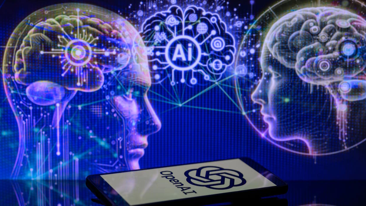  The OpenAI logo is being displayed on a smartphone with an AI brain visible in the background, in this photo illustration taken in Brussels, Belgium, on January 2, 2024. (Photo illustration by Jonathan Raa/NurPhoto via Getty Images). 
