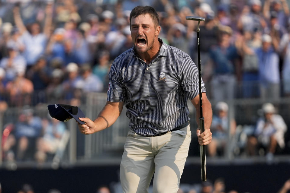 Bryson DeChambeau celebrates after winning the U.S. Open golf tournament Sunday, June 16, 2024, in Pinehurst, N.C. (AP Photo/Frank Franklin II)