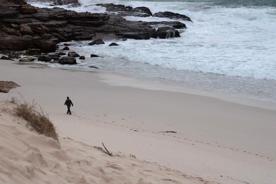 The french team were undergoing a recovery session at Diaz Beach when Medhi Narjissi was swept away (AFP via Getty Images)