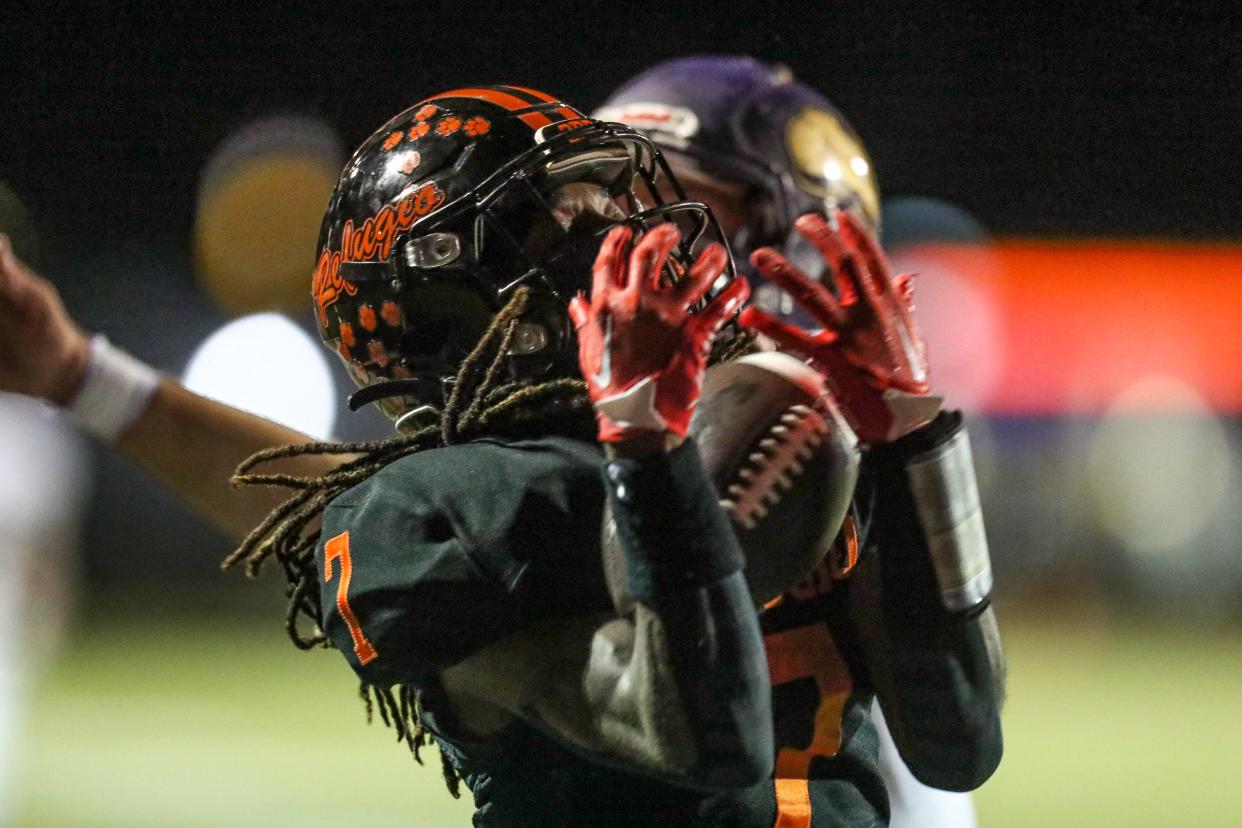 Refugio’s Ernest Campbell catches a touchdown pass on Friday, Oct. 21, 2022, at Bobcat Stadium in Refugio, Texas.