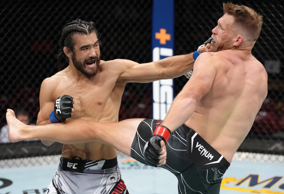 SAN DIEGO, CALIFORNIA - AUGUST 13: (L-R) Josh Quinlan punches Jason Witt in a 180-pound catchweight fight during the UFC Fight Night event at Pechanga Arena on August 13, 2022 in San Diego, California. (Photo by Jeff Bottari/Zuffa LLC)