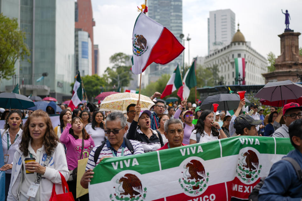 Judicial workers protest the government's proposed judicial reform, which would make judges stand for election, outside the Senate in Mexico City, Tuesday, Sept. 10, 2024. (AP Photo/Eduardo Verdugo)