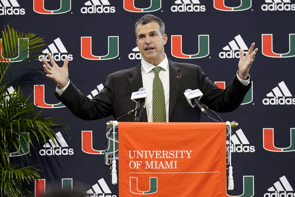Miami football coach Mario Cristobal speaks after being introduced at a news conference, Tuesday, Dec. 7, 2021, in Coral Gables, Fla. Cristobal is returning to his alma mater, where he won two championships as a player. (AP Photo/Lynne Sladky)