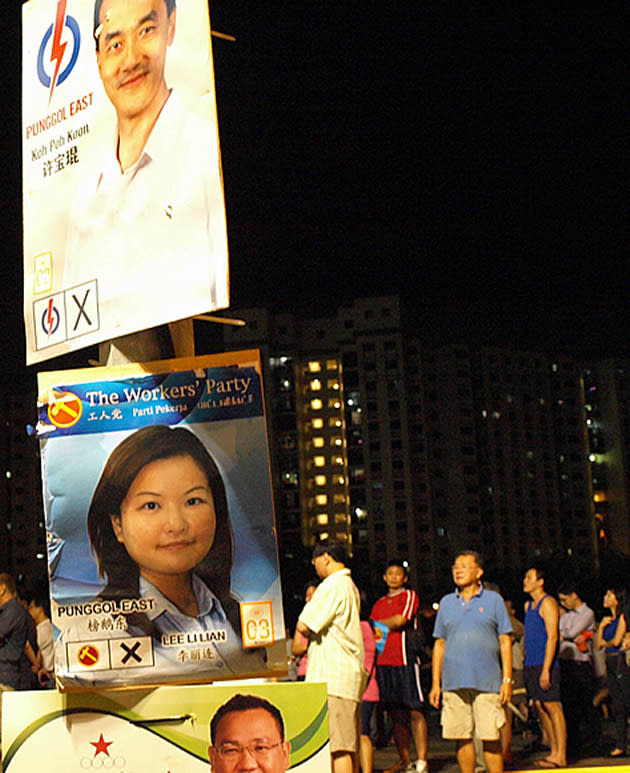 WP candidate Lee Li Lian's campaign poster hangs between the PAP's Dr Koh Poh Koon and the SDA's Desmond LIm. (Yahoo! photo)