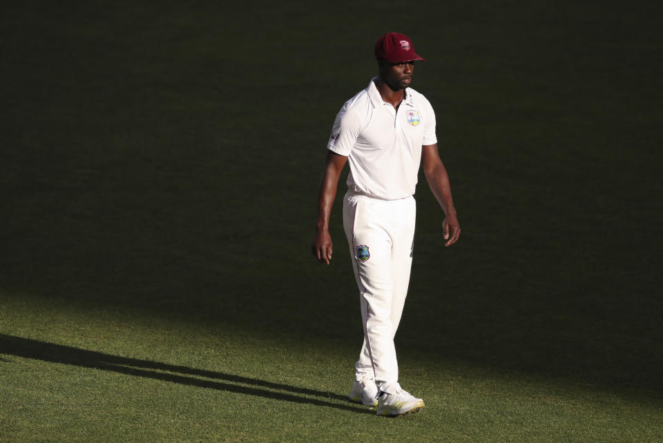 West Indies' Kemar Roach waits in the field during play on the third day of the first cricket test between Australia and the West Indies in Perth, Australia, Friday, Dec. 2, 2022. (AP Photo/Gary Day)