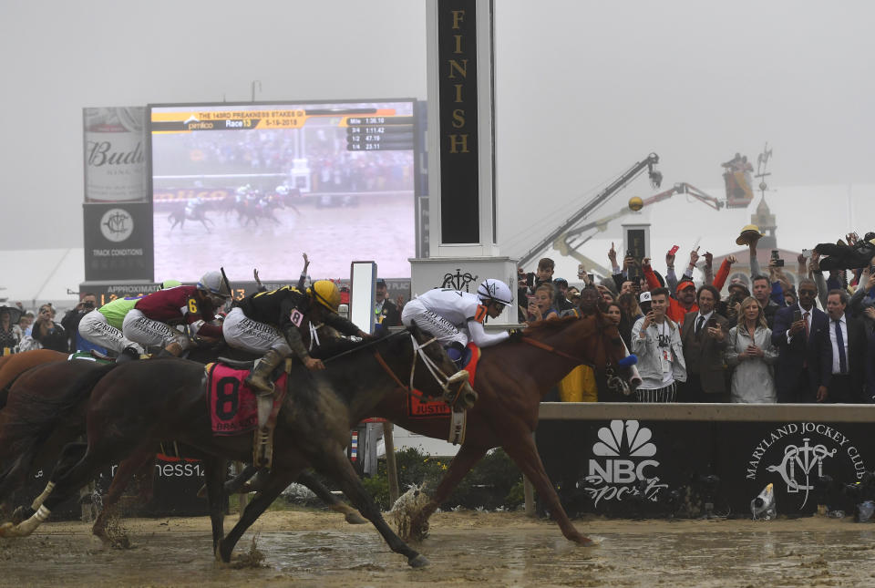 Justify with Mike Smith atop wins the 143rd Preakness Stakes horse race at Pimlico race track. (AP)