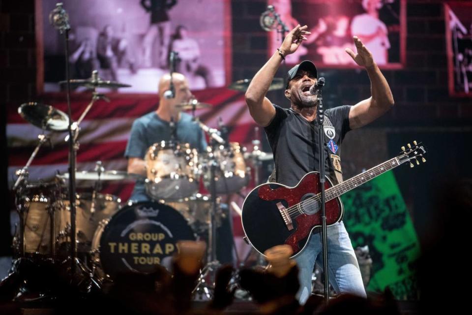 Darius Rucker and Jim Sonefeld perform with Hootie and the Blowfish during the first of three shows in their hometown during their “Group Therapy Tour” at Colonial Life Arena Wednesday, Sept. 11, 2019, in Columbia, S.C. The band, on hiatus since 2008, formed in 1986 while the members attended the University of South Carolina.