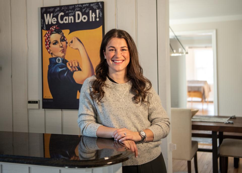 Anya Packer, the General Manager of the women's professional ice hockey team the Metropolitan Riveters, poses for a photo in her home on Wednesday Feb. 9, 2022. 