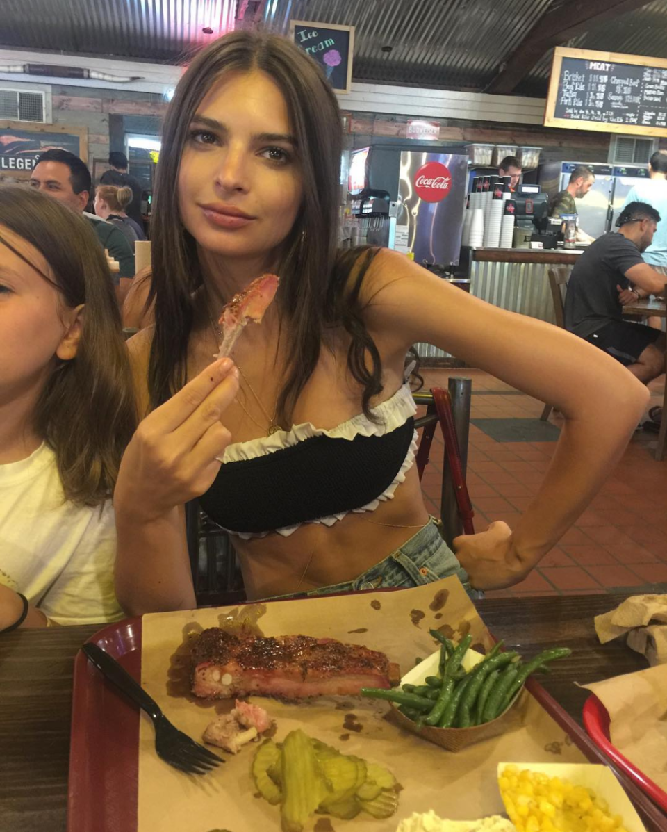 “When in Texas”. Emily shows us how to eat ribs in style in a bandeau monochrome number.
