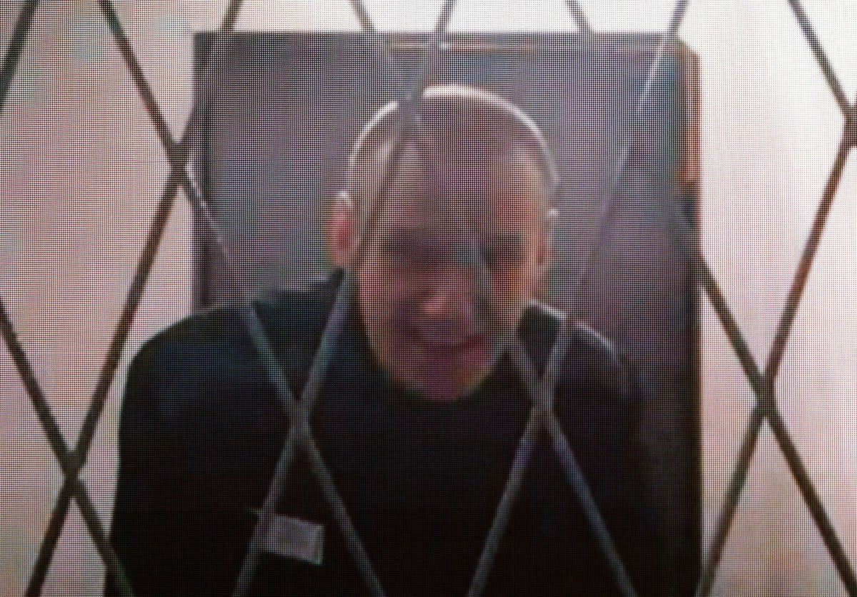 Alexei Navalny appears on a screen via a video link from the IK-3 penal colony in Kharp in January (REUTERS)