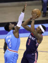 Washington Wizards' Bradley Beal, right, is defended by Houston Rockets' David Nwaba during the first quarter of an NBA basketball game Tuesday, Jan. 26, 2021, in Houston. (Carmen Mandato/Pool Photo via AP)