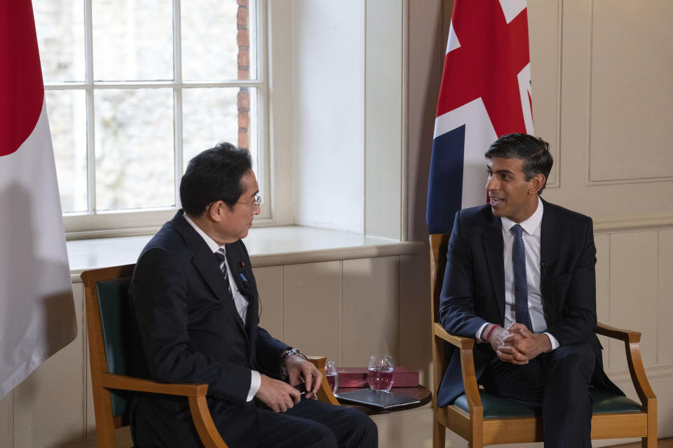 Britain's Prime Minister Rishi Sunak, right, speaks with Japan's Prime Minister Fumio Kishida during a bilateral meeting at the Tower of London, Wednesday, Jan. 11, 2023. The leaders of Britain and Japan are signing a defense agreement on Wednesday that could see troops deployed to each others’ countries. (Carl Court/Pool Photo via AP, File)