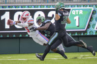 SMU wide receiver Danny Gray, left, scores a touchdown in the first half against Tulane defensive end Cameron Sample, center, during an NCAA college football game in New Orleans, Friday, Oct. 16, 2020. (AP Photo/Matthew Hinton)