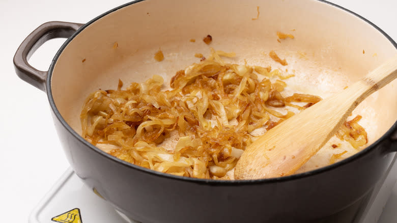 caramelizing onions in a pan