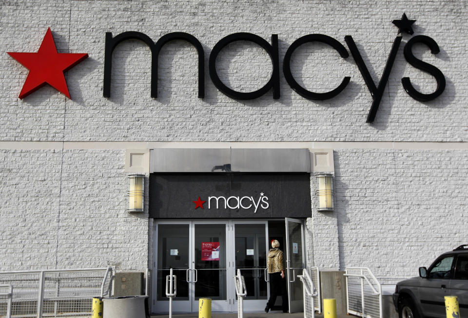 FILE - In this Nov. 3, 2011, file photo, a person enters a Macy's department store in North Attleboro, Mass. Macy's Inc. said Thursday, May 3, 2012, that revenue at stores open at least a year increased 1.2 percent in April, but fell short of Wall Street's expectations. (AP Photo/Steven Senne, File)