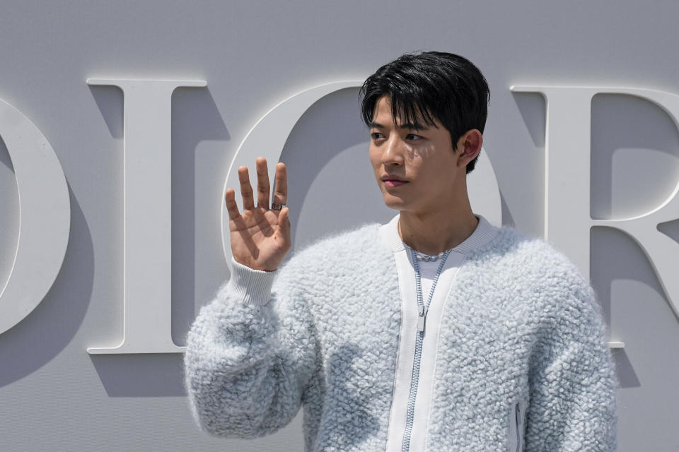 Park Solomon poses for photographers upon arrival at the Dior Menswear Spring/Summer 2024 fashion collection presented in Paris, Friday, June 23, 2023. (AP Photo/Michel Euler)