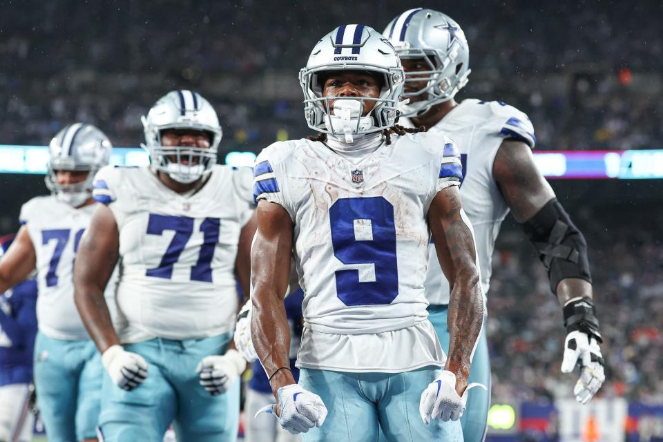 Cowboys wide receiver KaVontae Turpin celebrates his rushing touchdown with teammates during the second half against the Giants.