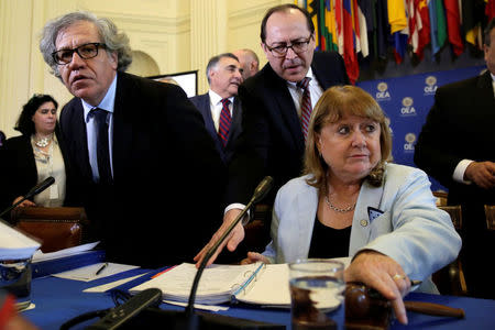 Organization of American States (OAS) Secretary General Luis Almagro (L) and Argentine Foreign Minister Susana Malcorra open a meeting of foreign ministers to discuss the situation in Venezuela in Washington, U.S., May 31, 2017. REUTERS/Yuri Gripas