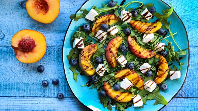 salad with feta, peaches, and blueberries