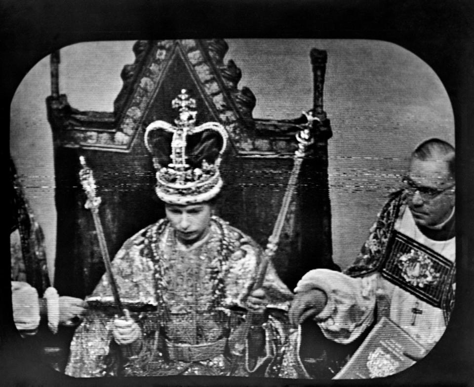 Queen Elizabeth II wears St Edward’s Crown at the Coronation ceremony at Westminster Abbey. This was the view as seen by television viewers immediately after the Archbishop of Canterbury, Dr Geoffrey Fisher, placed the Crown upon the Queen’s head (PA/PA Wire)