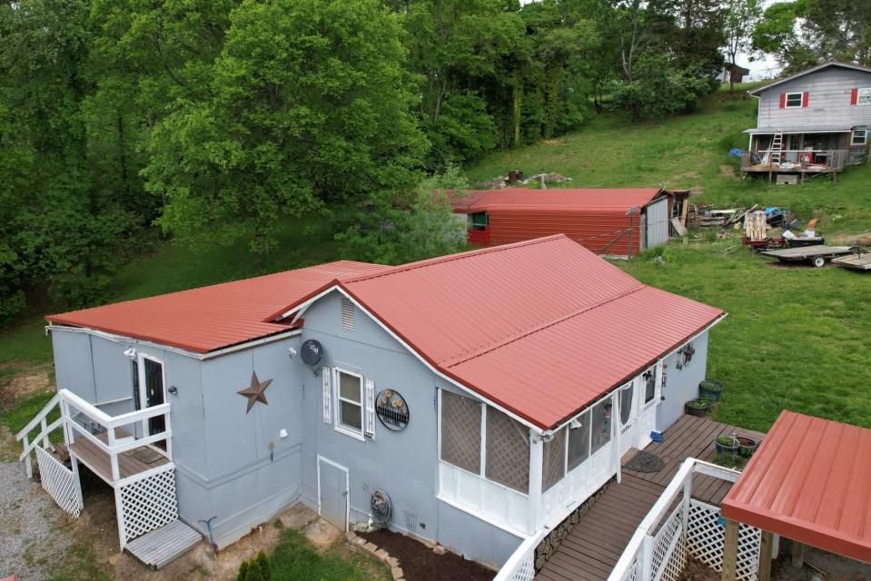 Tracie Gamble’s Seymour home after FLOW Roofing and True Metal Supply installed the new roof. April 24, 2023.