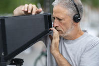 In this image released by Focus Features, director Jon Stewart appears on the set during the filming of "Irresistible." (Daniel McFadden/Focus Features via AP)