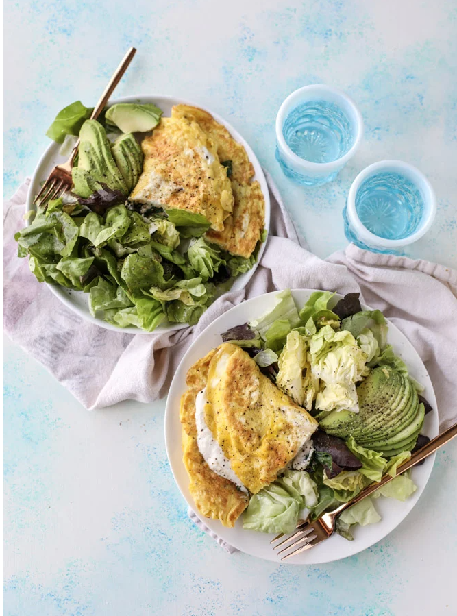 <p>Sure, you could have a regular omelet for breakfast, but why not have a burrata omelet? This ultra-decadent dish makes for the perfect brunch plate, is extra cheesy and creamy, and will keep you full all morning long.</p><p><em><a href="https://www.howsweeteats.com/2017/01/15-minute-spinach-burrata-omelet-avocado-salad/" rel="nofollow noopener" target="_blank" data-ylk="slk:Get the recipe from How Sweet Eats»" class="link ">Get the recipe from How Sweet Eats»</a></em></p>