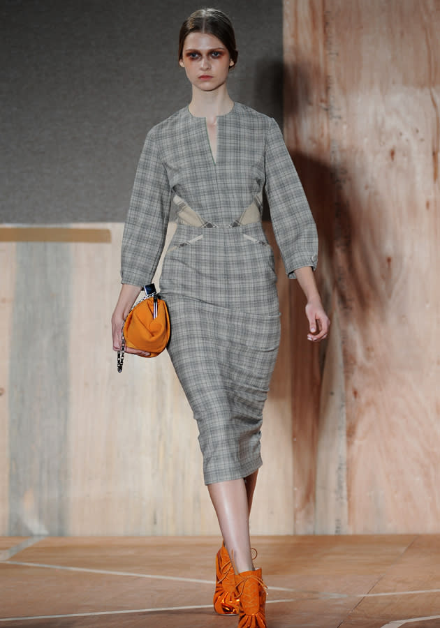 <p><strong>LFW AW13: Roksanda Ilincic</strong><br><br>Plaid prints in flattering shapes with colour-pop accents hit the runway today.<br><br>© Getty</p>