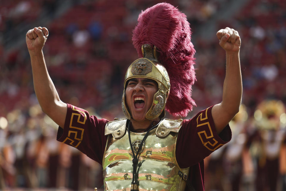 Southern California drum major Jacobo Herrera performs before an NCAA college football game against UCLA, Saturday, Nov. 18, 2023, in Los Angeles. (AP Photo/Ryan Sun)