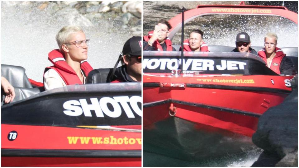 Biebs boards a boat and looks, well bored...