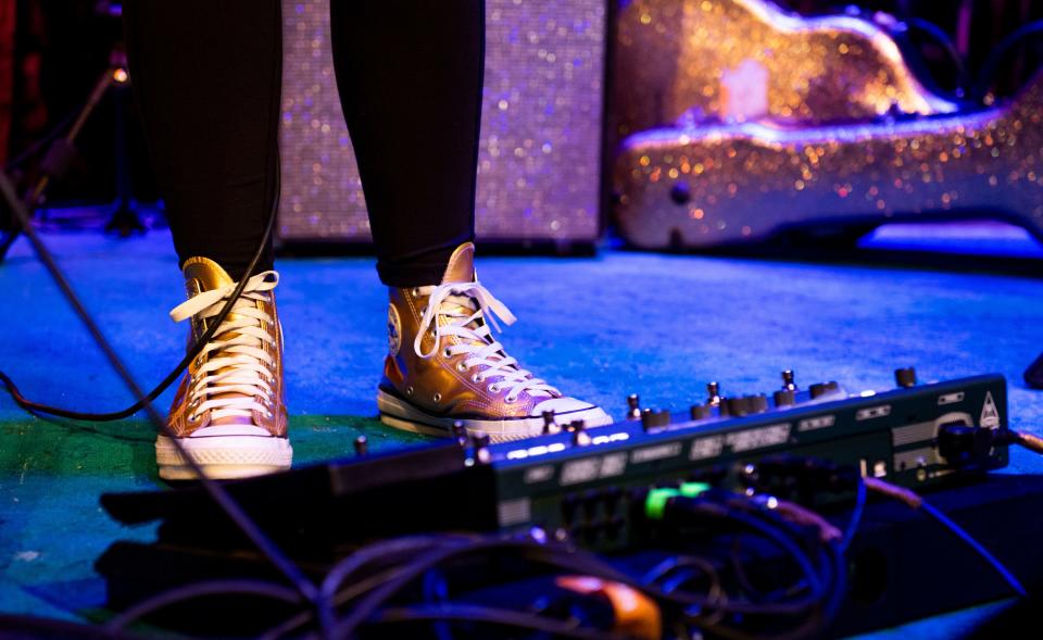 Jackie Venson sports gold sneakers during her set at the Analog in Nashville.