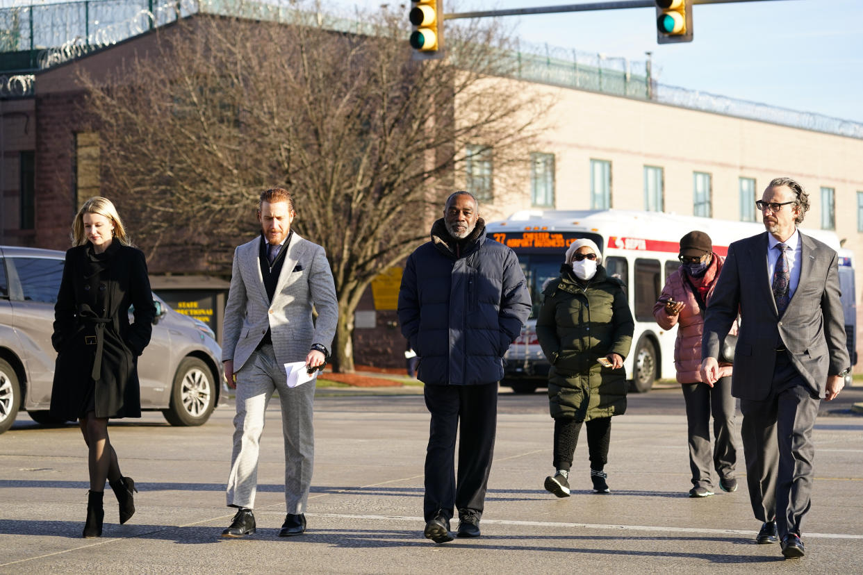 Willie Stokes, center, walks from a state prison in Chester, Pa., on Jan. 4, 2022, after his 1984 murder conviction was overturned because of perjured witness testimony. (AP Photo/Matt Rourke)