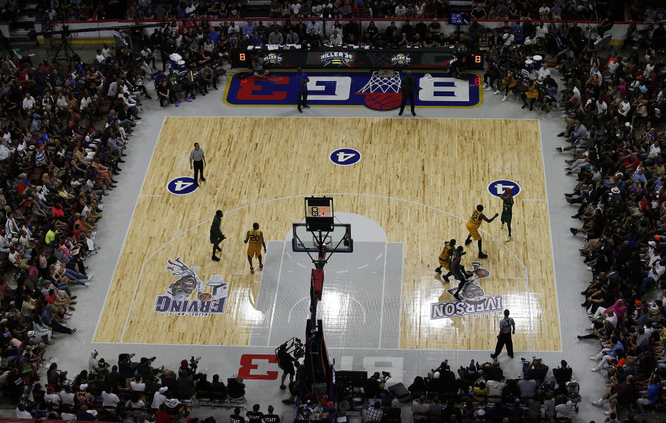 An overhead view of a BIG3 basketball game in 2017. The court is half of a regular basketball court with only three players per team.