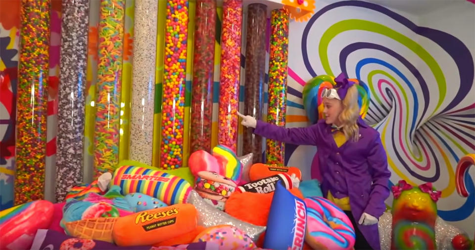 <p>In 2019, Siwa and her family moved into a California mansion complete with a candy counter, mannequins wearing her iconic costumes and a room filled with her branded merchandise. Siwa showed off her <a href="https://people.com/home/see-inside-jojo-siwas-over-the-top-california-mansion-complete-with-in-home-7-eleven/" rel="nofollow noopener" target="_blank" data-ylk="slk:colorful, over-the-top, candy-filled residence;elm:context_link;itc:0;sec:content-canvas" class="link ">colorful, over-the-top, candy-filled residence</a> to fans on YouTube in January 2020. </p>